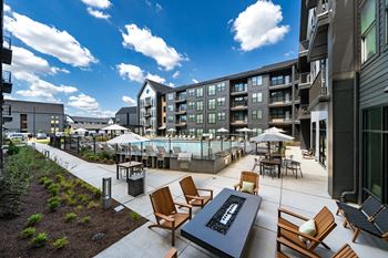 Three firepit lounge courtyards with plush seating and outdoor entertainment space